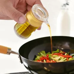 Akryl transparent och guldfärgad oljeflaska flytande kryddkanna sojasås vinägerkanna kök (M)