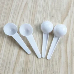 1g mätskedar mycket noggrann mjölkpulversked rundbottnad minisked för resor