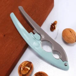Halkfritt handtag Valnötsknäckare Kök Nötknäppare Sheller Clip Verktygsklämma för razilnötter Hasselnötter Mandlar