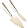 Kakspade och kniv i guldfärgat stål, 2 st.