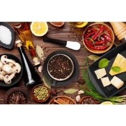 Kryddmortel i svart porslin