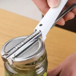 Livsmedelsklassad rostfri burköppnare Justerbar flasköppnare Öppnar enkelt flasklock