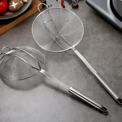 Lång silsked i rostfritt stål för säker och skållningsfri köksmatlagning