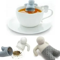 Mat och luktfritt silikon tesilfilter för örtte i form av en man som tar ett bad i koppen