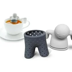 Mat och luktfritt silikon tesilfilter för örtte i form av en man som tar ett bad i koppen