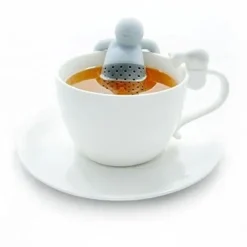 Mat och luktfritt silikon tesilfilter för örtte i form av en man som tar ett bad i koppen