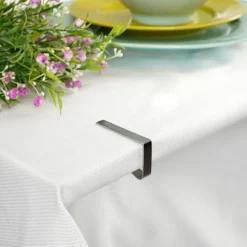 Metallklämma för bordsduk