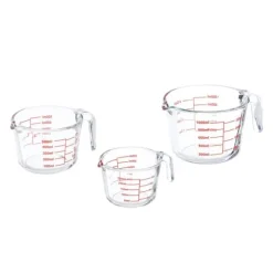 Måttkannset, 7x10x13.5 cm, Transparent, Röd