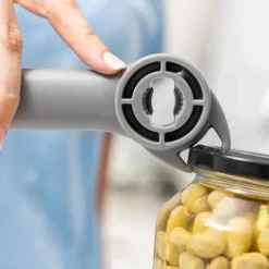 Multifunktionell Burk- och Kapsylöppnare