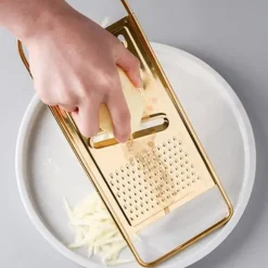 Platt rivjärn ostriv i rostfritt stål