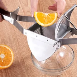 Potatispress och fruktpress i rostfritt stål