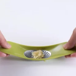 Pressa vitlök - JOSEPH JOSEPH - Vitlökspress - Stål - 18.5 x 3 x 4 cm - Grön