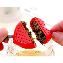 Teaboll - Deco Maison - Hjärta genomborrat av en pil - Plast - 16 cm - Kökstillbehör