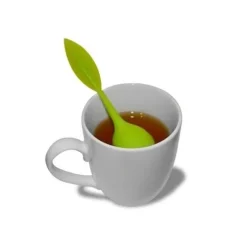 Te-infusatorn med rött stöd för heminredning köksredskap