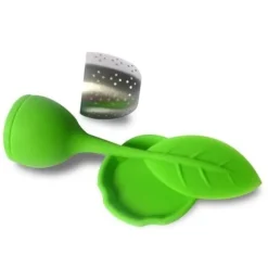 Te-infusatorn med rött stöd för heminredning köksredskap