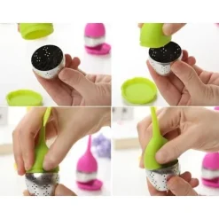 Te-infusatorn med rött stöd för heminredning köksredskap