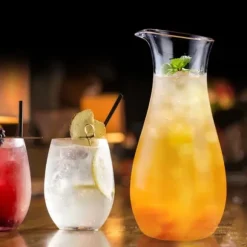 Transparent akryl juiceflaska - elegant dryckesbehållare för bar och hem