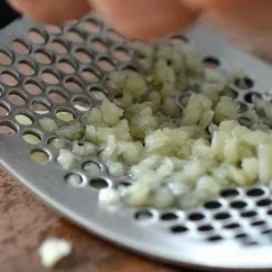 Vitlökspress med handtag