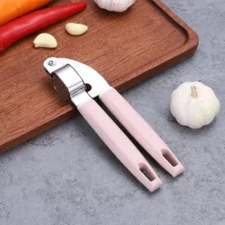 Vitlökspress Rostfritt stål Plasthandtag Vitlöksfärs Lätt att pressa rengöring Vitlökskross för kök Rosa