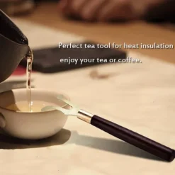 Värmeisolerande teklämma gaffel med trähandtag - gjutjärnshuvud